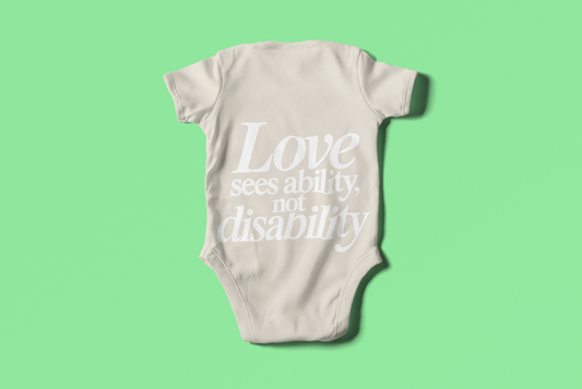 Love sees ability, not disability Baby Bodysuit